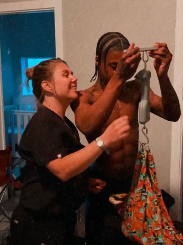 annapolis home birth midwife weighs baby